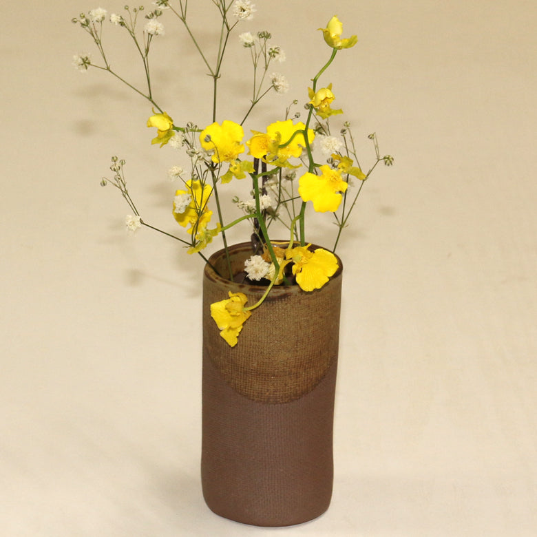 巻花入
